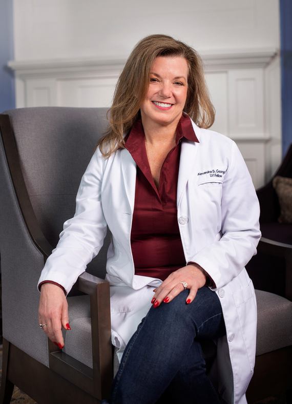 Dr Alex sitting in chair